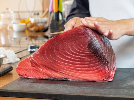 Fresh bluefin tuna loin in kitchenの写真素材