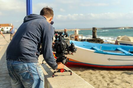 Cameraman with digital cinema camera