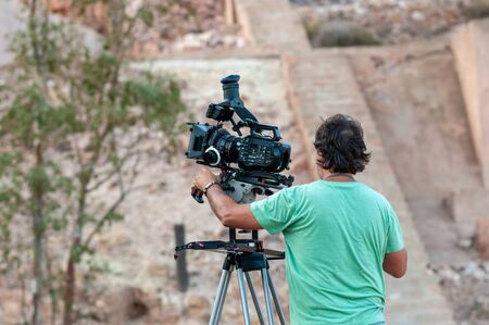 Camera operator with film camera