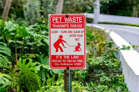 Sign with warning about pet wasteの写真素材