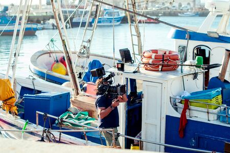 Cameraman with digital cinema cameraの写真素材