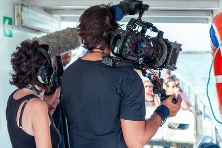 Cameraman with digital cinema cameraの写真素材