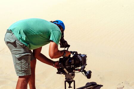 Cameraman with digital cinema cameraの写真素材