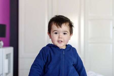 Little boy in blue sweatshirtの写真素材
