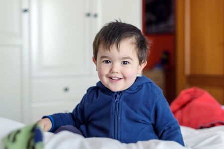 Little boy in blue sweatshirt