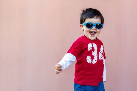 Boy with blue sunglasses