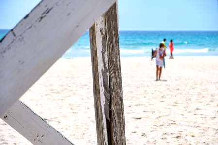 Wooden slats of structure on beach shore in cadizの写真素材