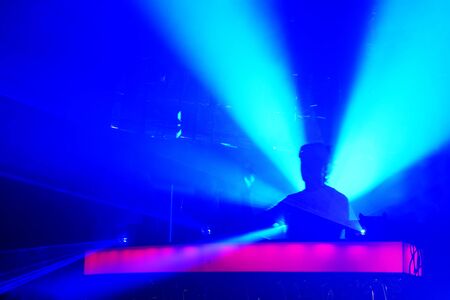 Dj live electronic concert, Dee jay in the stage in electronic music festivalの写真素材