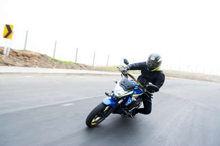 riding motorcycle on highway, biker ridingのeditorial素材