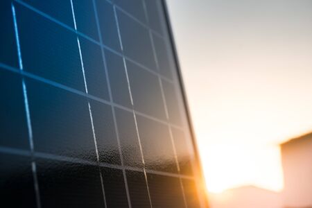 solar panel in residential area sunsetの写真素材