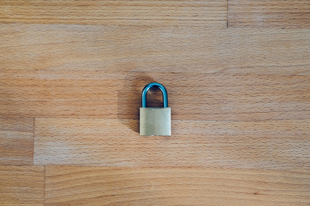 lock as symbol for Privacy and General Data Protection Regulation on wooden tableの写真素材