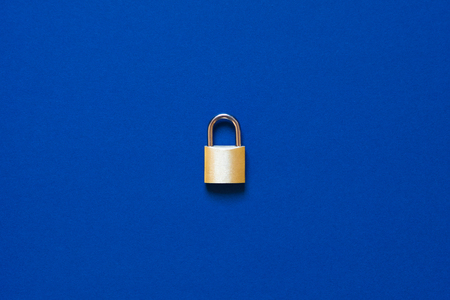 Lock as symbol for Privacy and General Data Protection Regulation on blue background
