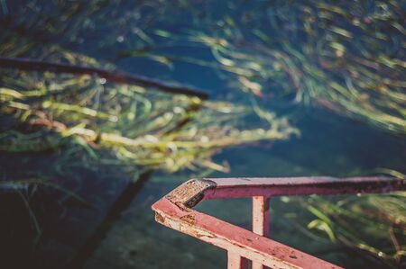 handrail to a sea in autumn