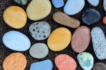Composition of beautiful beach stones rounded by wavesの写真素材