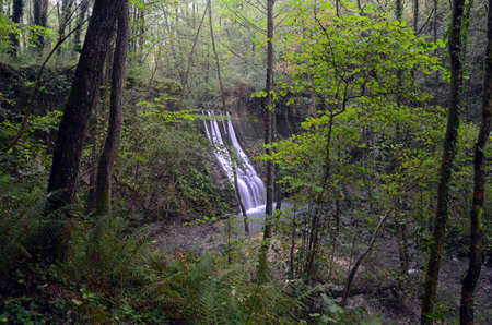 Beautiful waterfall on the Bolintxu river, Bizkaia, Pais Vasco, Spainの写真素材