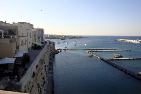 Otranto, Italy, Europe - July 11, 2016 Panorama of the city, the sea coast, the beach and bathersのeditorial素材