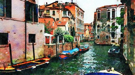 a glimpse of the small canals with boats between the historic buildings in the center of Veniceの写真素材