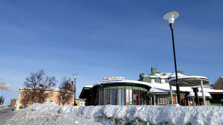 Kiruna, Sweden, February 23, 2020. The historic bus station in one of the squares in the snowy...