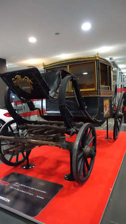 Turin, Italy - juni 20, 2021: an antique horse carriage with wooden wheelsのeditorial素材