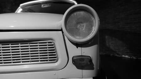 Turin, Italy - June 20, 2021: a headlight of an antique car at the Automobile Museumのeditorial素材