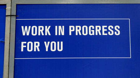 Work in progress message on a blue panel.