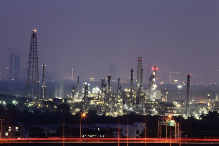 Factory near the town on the night shot