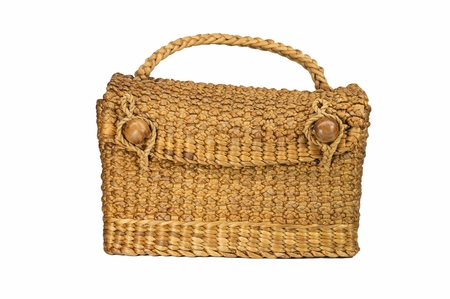 hand made grass handbag isolated on a white background の写真素材
