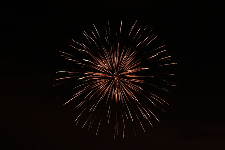 Firework explosion isolated on a black backgroundの写真素材