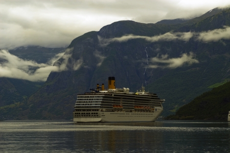 Cruise ship in fjord at Flaam village, norwayのeditorial素材