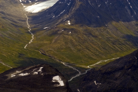 Jotunheimen in norway, mountains with green valleys and glaciersの写真素材