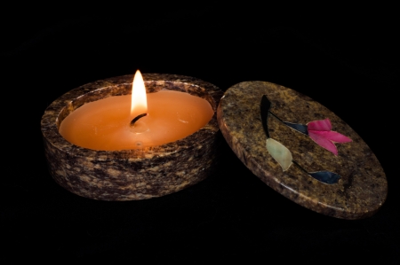 Candle in decorative holderの写真素材