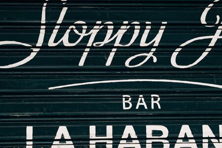Typography on shutter of barの写真素材