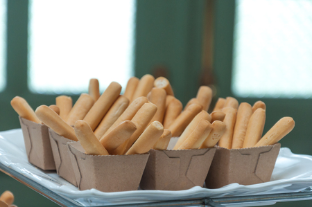 Cup of Bread sticks grissini as an appetizer