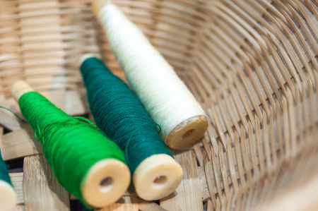 old tool to make the thread bobbin for the shuttle of ancient loom and Cotton is raw for weave,...