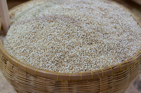 Quinoa grain in Bamboo Basketの写真素材