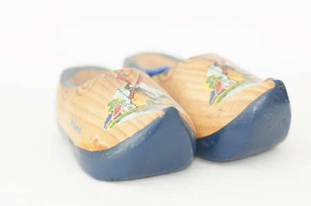 A pair of wooden shoes painted by handの写真素材