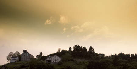 Sunset twilight on the hill of a valleyの写真素材