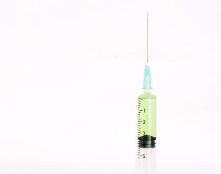Closeup of syringe to inject medicamentの写真素材