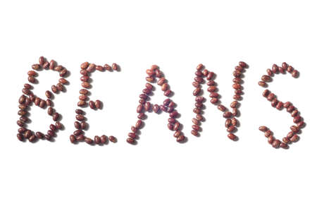 Word made with red beans on white backgroundの写真素材