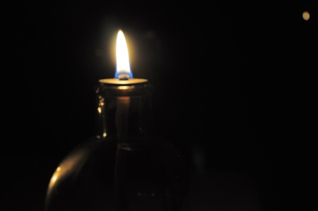 Oil lamp in the darkの写真素材