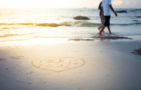 happy couple on the beachの写真素材