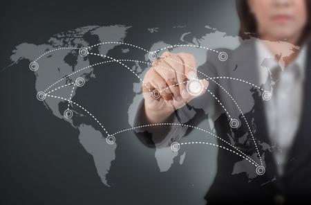 Businesswoman point in the mapの写真素材