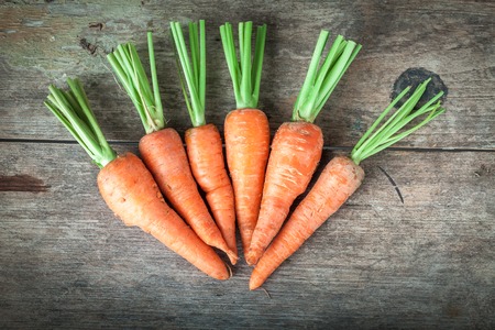 carrots on a wooden backgroundの写真素材