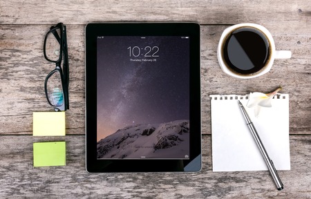 Chiang mai,THAILAND Fab 25, 2015:Apple iPad displaying iOS 8 homescreen. iOS 8 mobile operating...