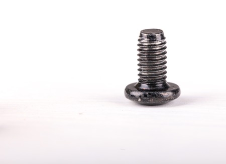Screws located on a white backgroundの写真素材