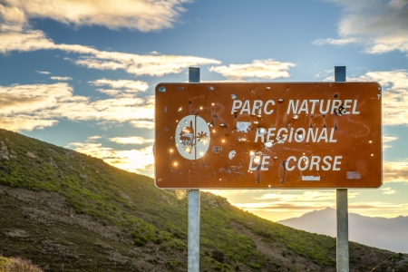 Parc Natural De Corse signpost riddled with hunterの写真素材