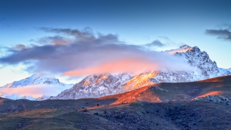 A snow covered Monte Cinto at dawn taken from the Col de San Colombano in northern Corsica at sunriseの写真素材