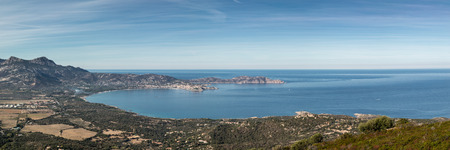 Panoramic view across Calvi Bay and the headland of Revellata on the coastline of the west coast of Corsicaの写真素材