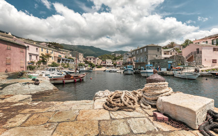 CENTURI, CORSICA - 10th JULY 2018. Fishing boats moored in the small harbour at Centuri on Cap Corse...