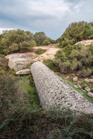 Monolith of Algajola. A large granite column measuring 17.36m by 2.74m cut in 1837 to be used for a...